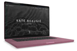 The Kate Beaugié website, displayed on a MacBook 16 screen, shows a monochromatic full-screen image of ripples refracting light in water. The words ‘Kate Beaugié, Light Artist’ are superimposed over the top.